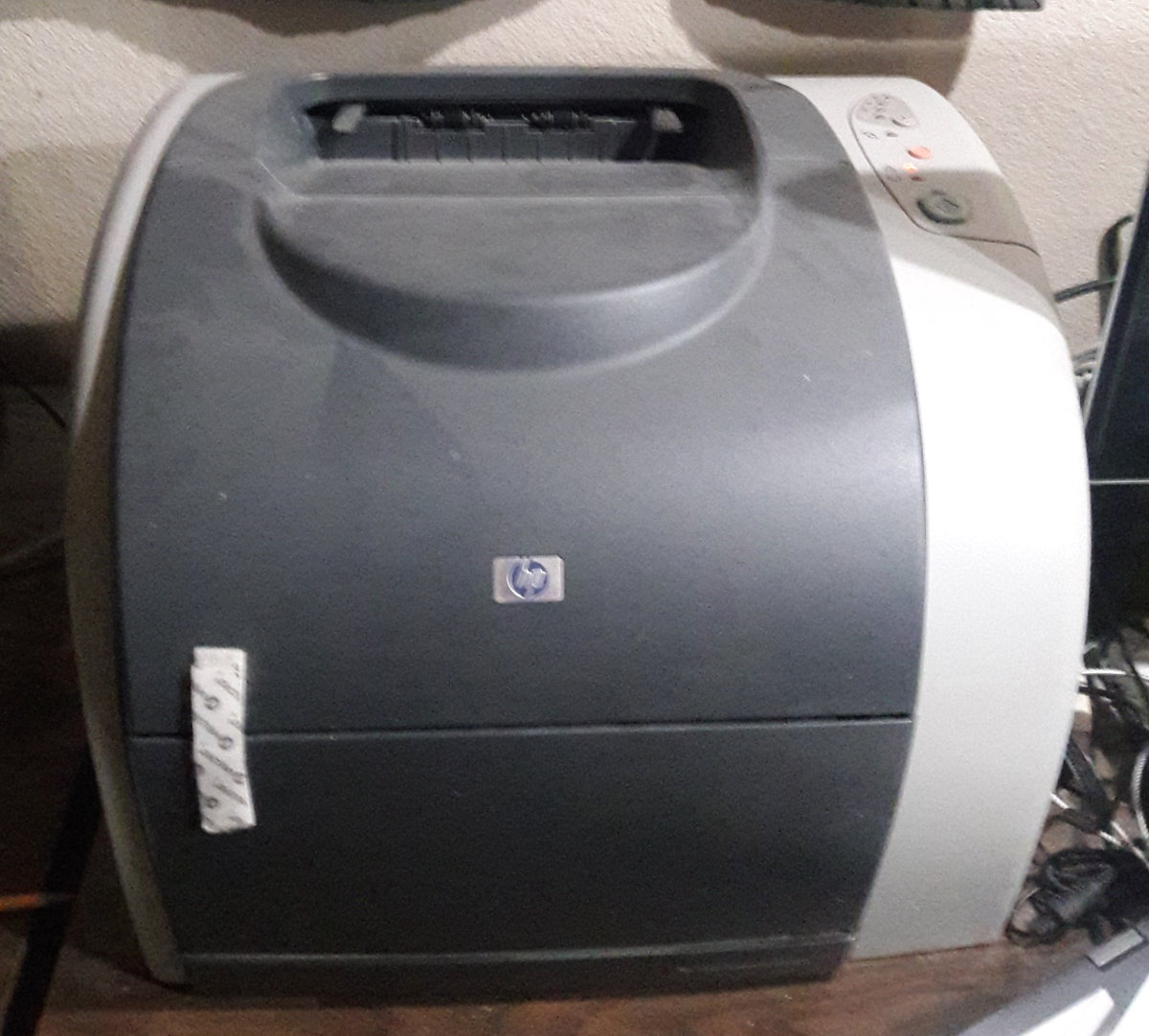 A picture of my old dinosaur printer, also from HP (an L2550 color laser printer)